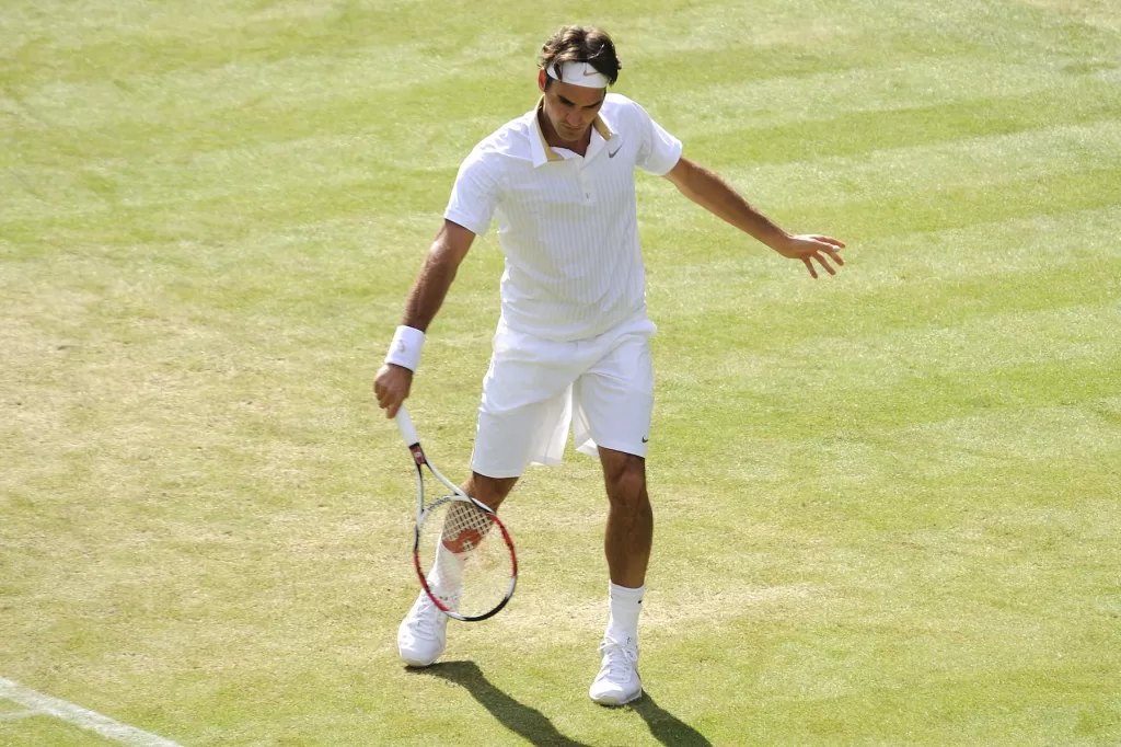 Roger Federer hitting a backhand